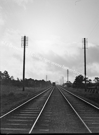 CONVERGING TRACKS REDEDING TRAIN